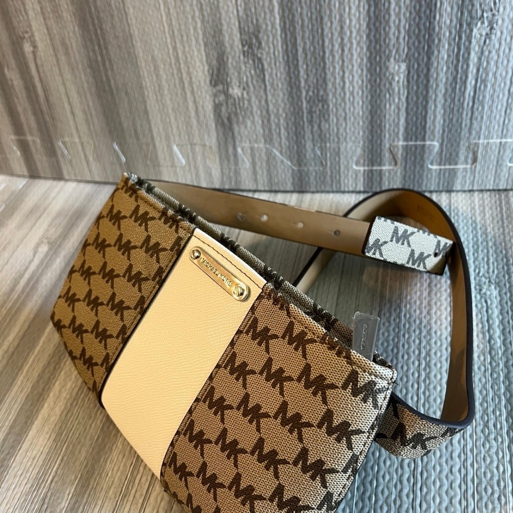 Micheal kors Fanny pack. Cute when you don’t want to carry a big purse